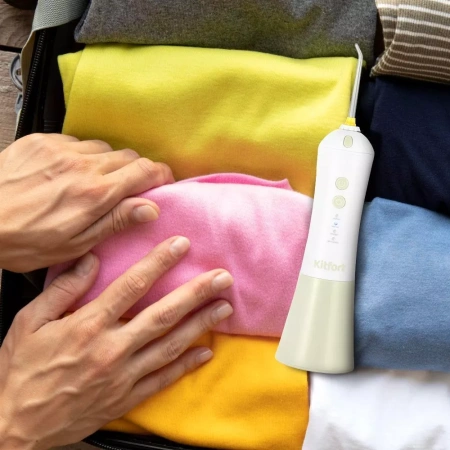 Ирригатор для полости рта Kitfort KT-2958-2 (бело-фисташковый)